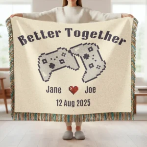 women holding a woven blanket with the pixel game controller design saying better together with custom names and date
